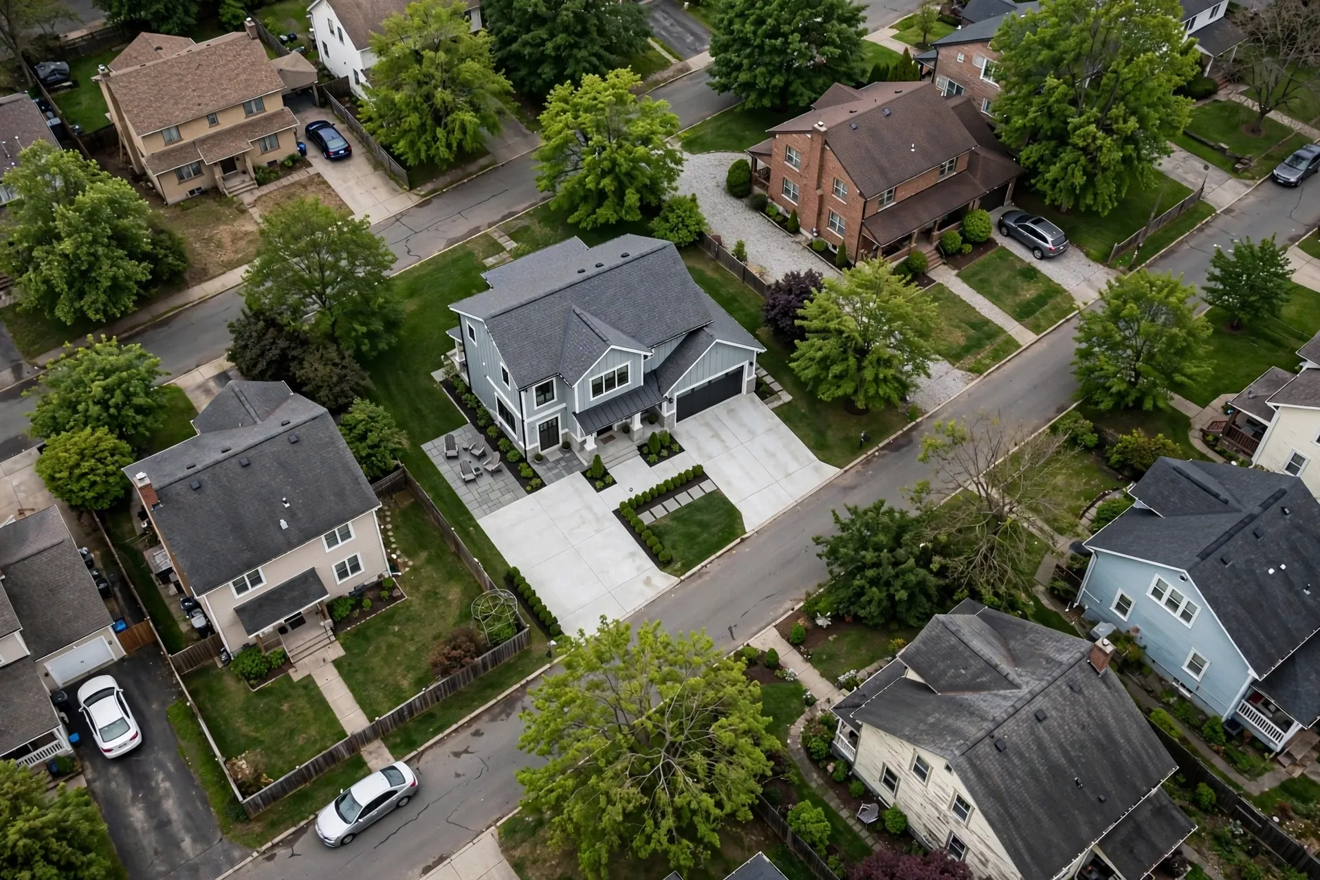 Aerial drone view of suburban residential street and houses